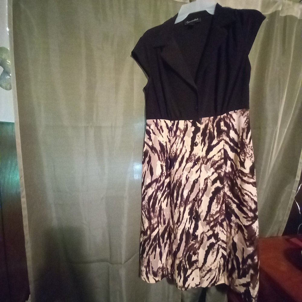 Office style, A Collared Button Top Dress with Animal print bottom.